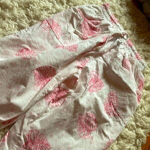 white with pink leaves all around